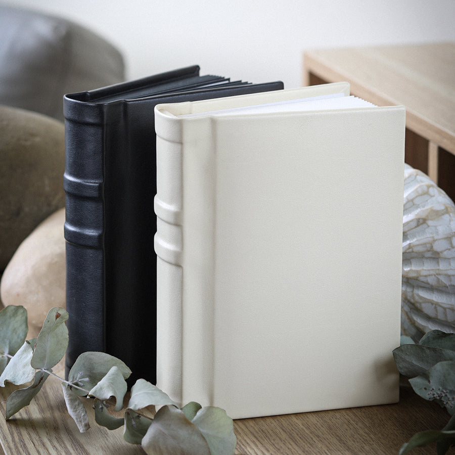 Create Your Own Quality, 5x7 inch Classic Black or Ivory Albums. They're easy to make yourself, or we can print your photos and assemble the album for you.
