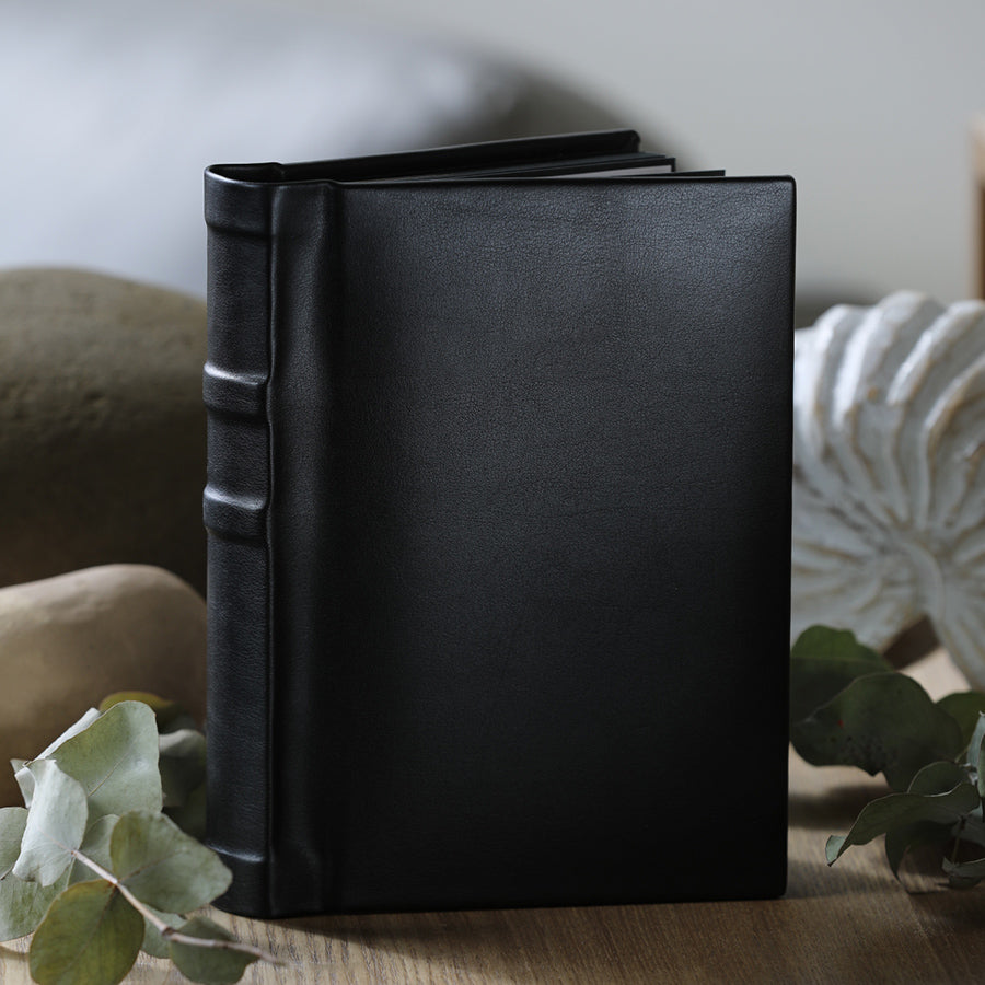 Create Your Own Quality, 5x7 inch Classic Black or Ivory Albums. They're easy to make yourself, or we can print your photos and assemble the album for you.