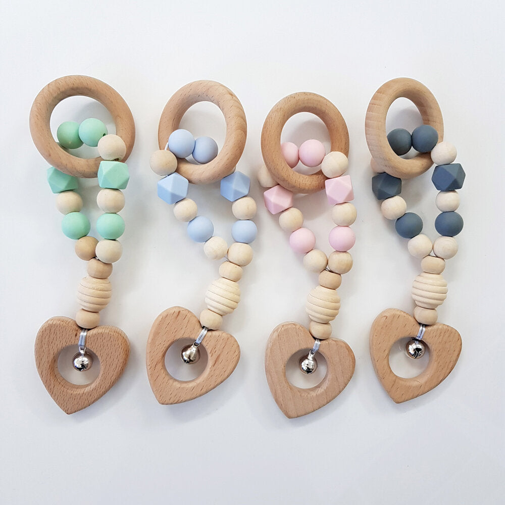 <strong> 30% off </strong> Teething Rattle With Silicone Beads &amp; Beechwood The Photographer's Toolbox Teether 14.00 The Photographer's Toolbox