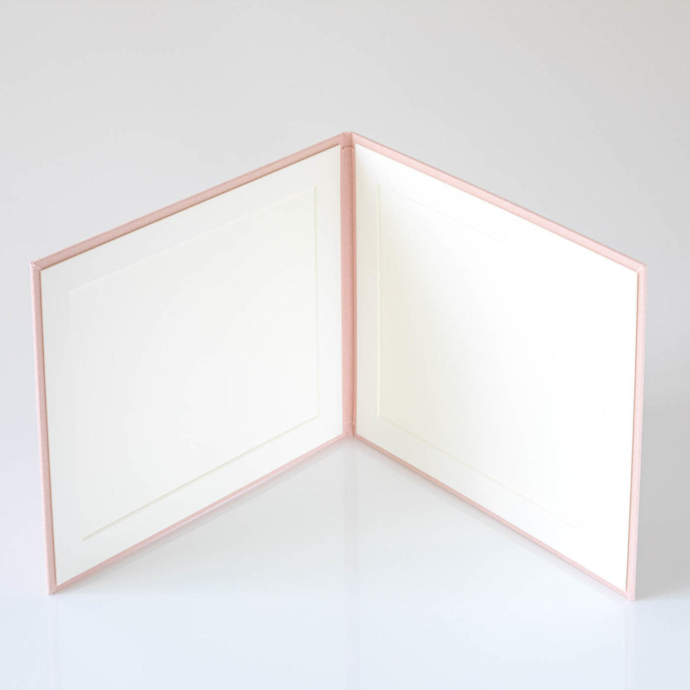 Photo Display Frames are like mini photo albums that hold two. Use our "Personalise Your Product" software to create your unique cover design.They are designed to be displayed and are ideal for family, school, and wedding photos. Perfect Unique Gift Idea!