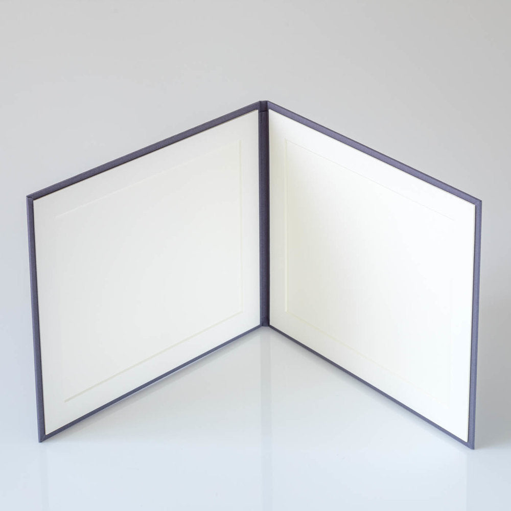 Photo Display Frames are like mini photo albums that hold two. Use our "Personalise Your Product" software to create your unique cover design.They are designed to be displayed and are ideal for family, school, and wedding photos. Perfect Unique Gift Idea!