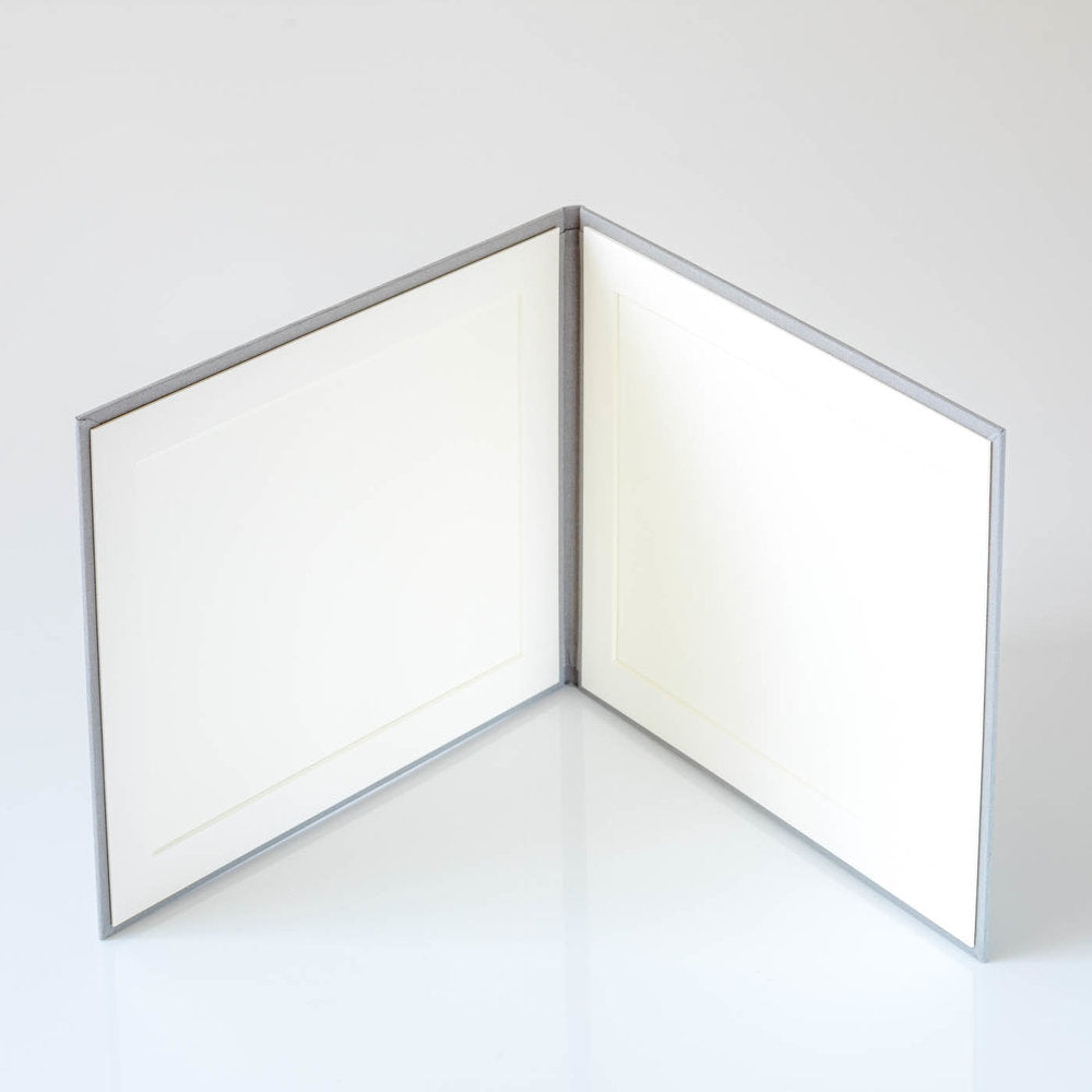 Photo Display Frames are like mini photo albums that hold two. Use our "Personalise Your Product" software to create your unique cover design.They are designed to be displayed and are ideal for family, school, and wedding photos. Perfect Unique Gift Idea!