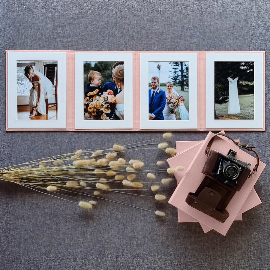 Photo Display Frames are like mini photo albums that hold four. Use our "Personalise Your Product" software to create your unique cover design.They are designed to be displayed and are ideal for family, school, and wedding photos. Perfect Unique Gift Idea!
