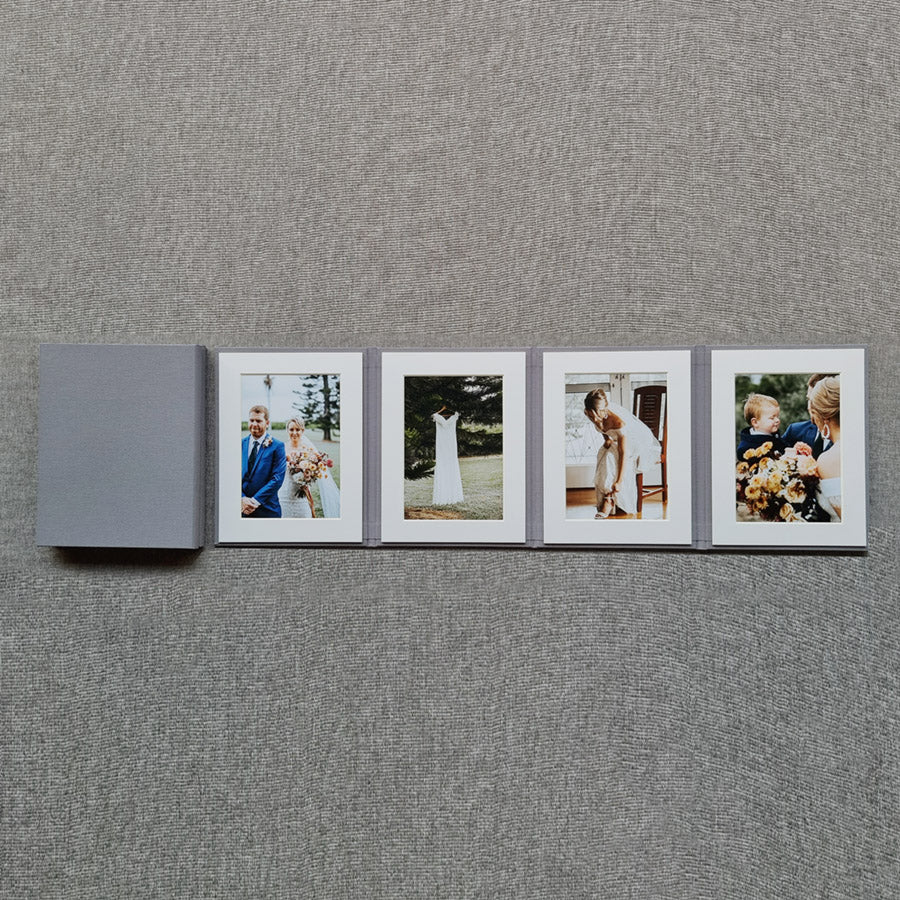 Photo Display Frames are like mini photo albums that hold four. Use our "Personalise Your Product" software to create your unique cover design.They are designed to be displayed and are ideal for family, school, and wedding photos. Perfect Unique Gift Idea!
