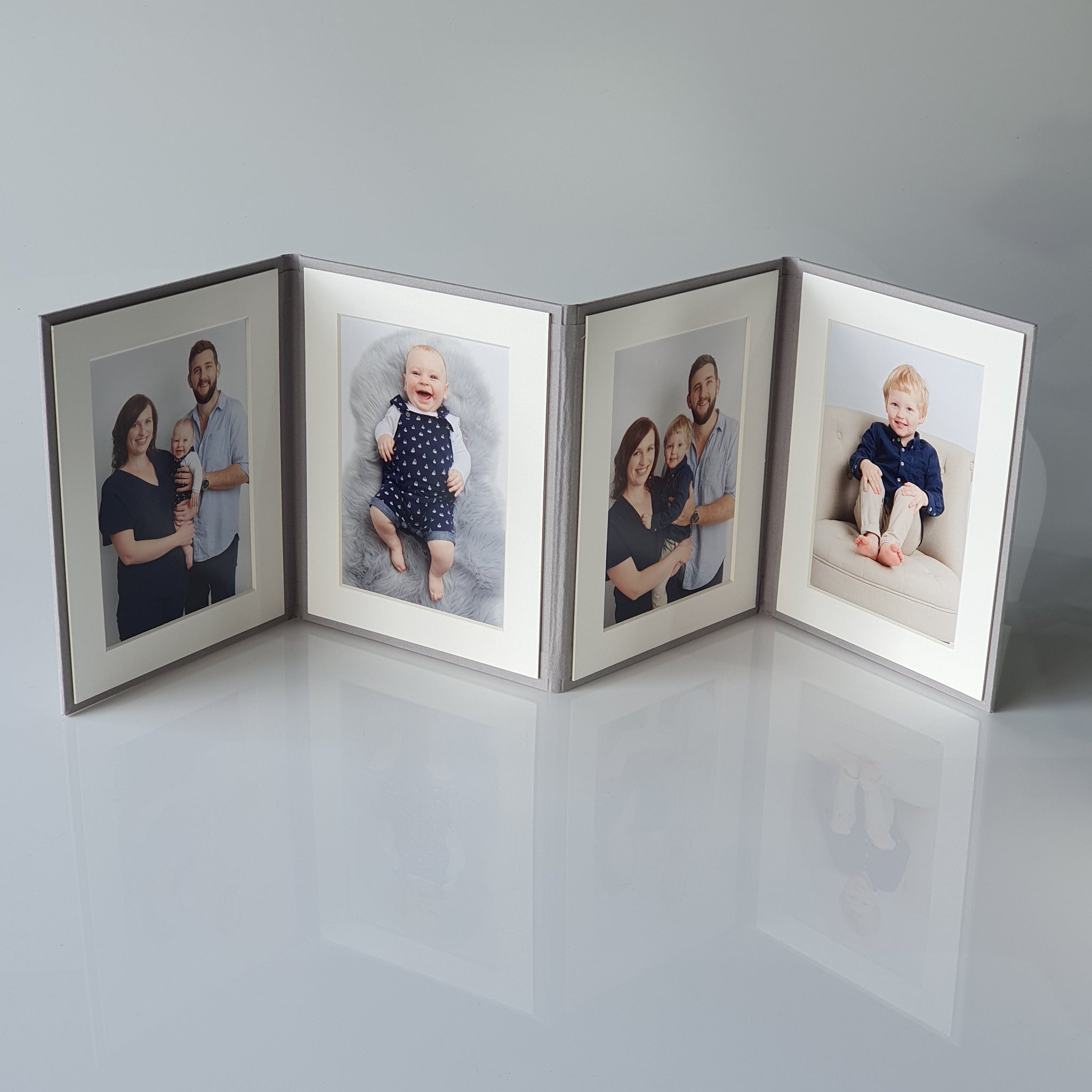 Photo Display Frames are like mini photo albums that hold four. Use our "Personalise Your Product" software to create your unique cover design.They are designed to be displayed and are ideal for family, school, and wedding photos. Perfect Unique Gift Idea!
