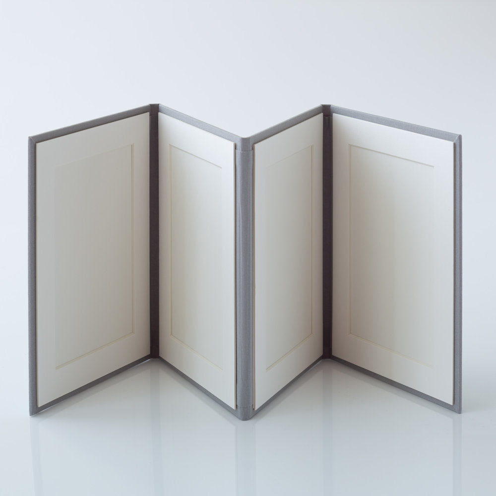 Photo Display Frames are like mini photo albums that hold four. Use our "Personalise Your Product" software to create your unique cover design.They are designed to be displayed and are ideal for family, school, and wedding photos. Perfect Unique Gift Idea!
