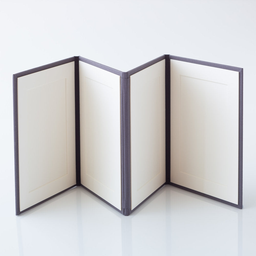 Photo Display Frames are like mini photo albums that hold four. Use our "Personalise Your Product" software to create your unique cover design.They are designed to be displayed and are ideal for family, school, and wedding photos. Perfect Unique Gift Idea!
