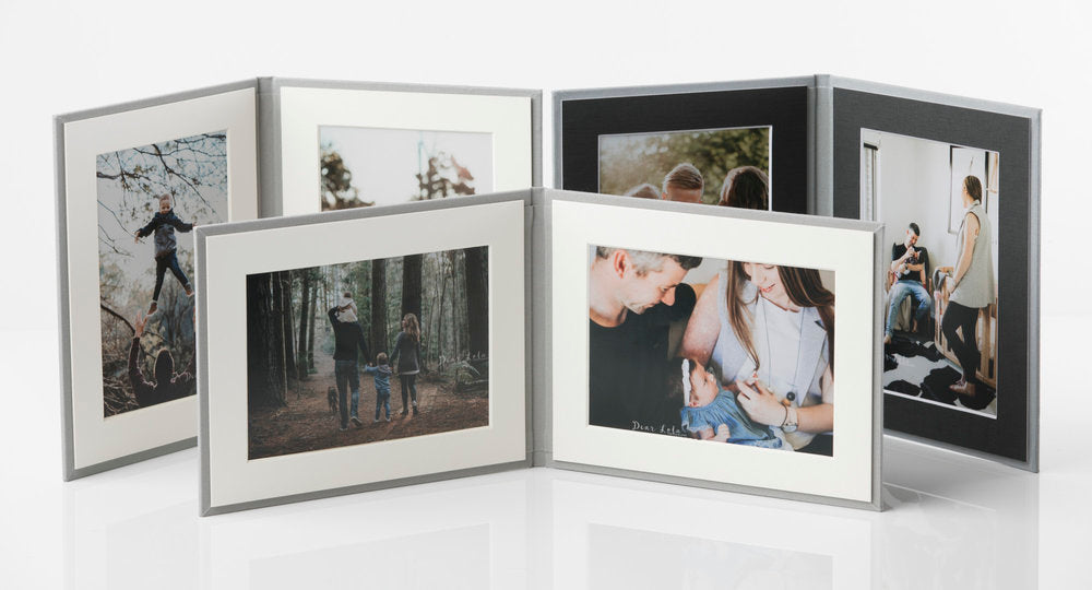 Photo Display Frames are like mini photo albums that hold two. Use our "Personalise Your Product" software to create your unique cover design.They are designed to be displayed and are ideal for family, school, and wedding photos. Perfect Unique Gift Idea!
