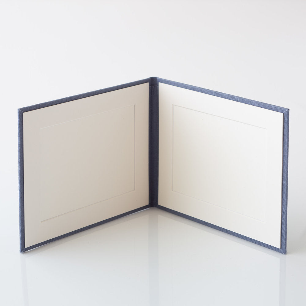 Photo Display Frames are like mini photo albums that hold two. Use our "Personalise Your Product" software to create your unique cover design.They are designed to be displayed and are ideal for family, school, and wedding photos. Perfect Unique Gift Idea!