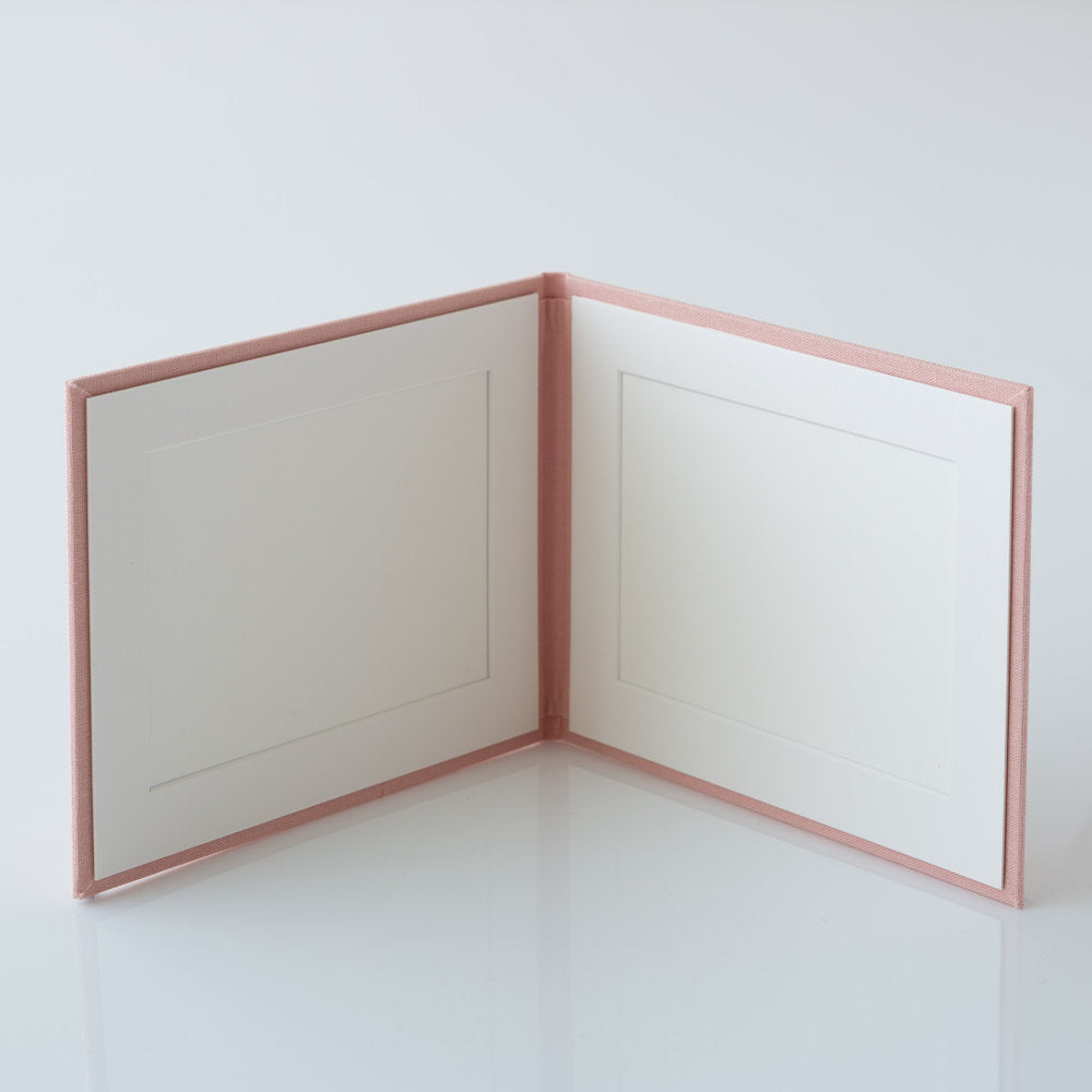 Photo Display Frames are like mini photo albums that hold two. Use our "Personalise Your Product" software to create your unique cover design.They are designed to be displayed and are ideal for family, school, and wedding photos. Perfect Unique Gift Idea!