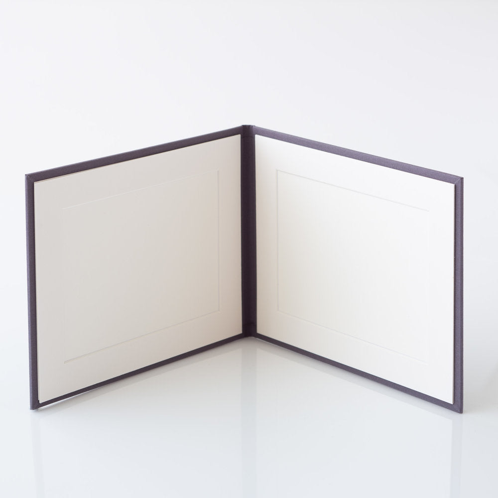 Photo Display Frames are like mini photo albums that hold two. Use our "Personalise Your Product" software to create your unique cover design.They are designed to be displayed and are ideal for family, school, and wedding photos. Perfect Unique Gift Idea!