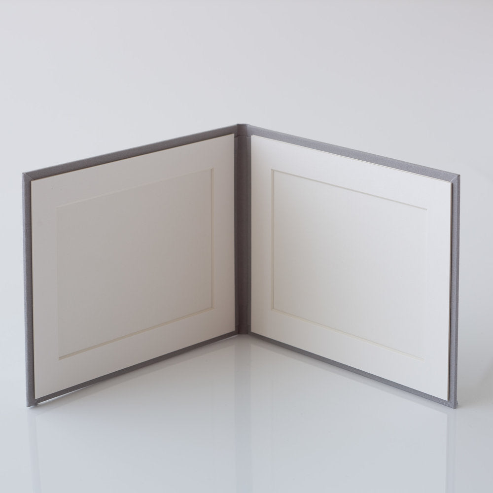 Photo Display Frames are like mini photo albums that hold two. Use our "Personalise Your Product" software to create your unique cover design.They are designed to be displayed and are ideal for family, school, and wedding photos. Perfect Unique Gift Idea!