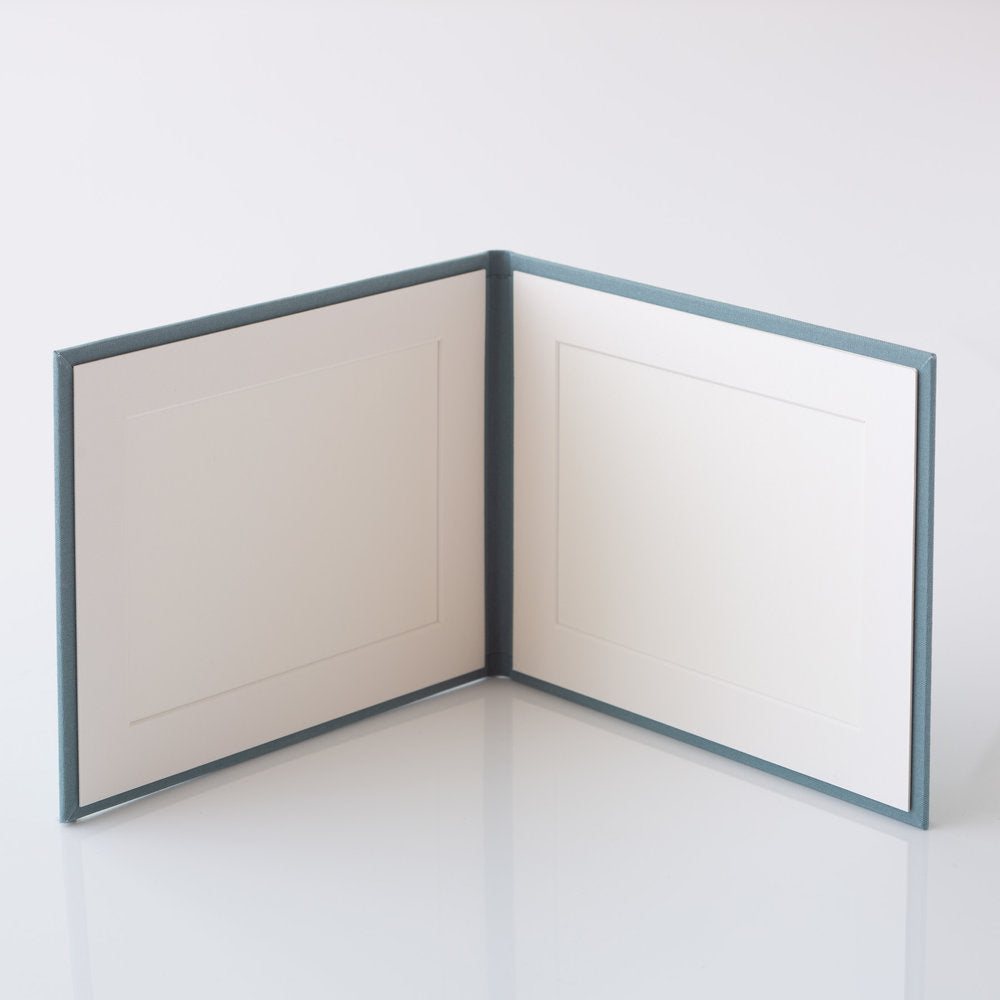 Photo Display Frames are like mini photo albums that hold two. Use our "Personalise Your Product" software to create your unique cover design.They are designed to be displayed and are ideal for family, school, and wedding photos. Perfect Unique Gift Idea!