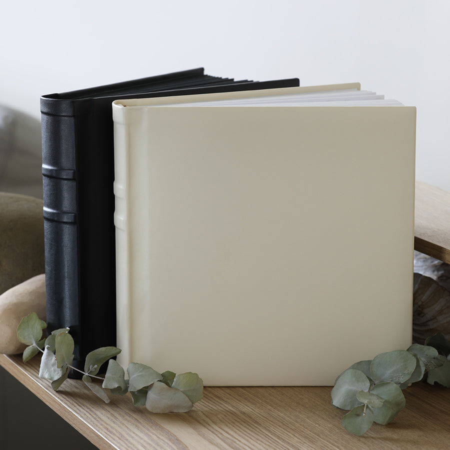 Create Your Own Personalised, Quality, 10x10 inch Black or Ivory Albums. They're easy to make yourself, or we can print your photos and assemble the album for you.
