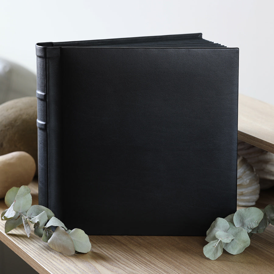 Create Your Own Personalised, Quality, 10x10 inch Black or Ivory Albums. They're easy to make yourself, or we can print your photos and assemble the album for you.
