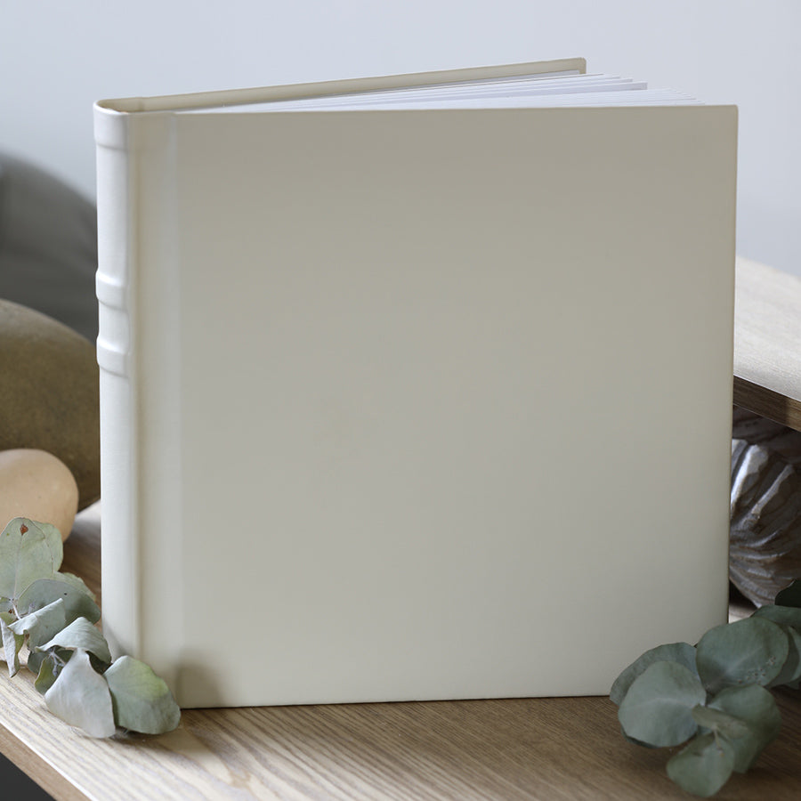 Create Your Own Personalised, Quality, 10x10 inch Black or Ivory Albums. They're easy to make yourself, or we can print your photos and assemble the album for you.
