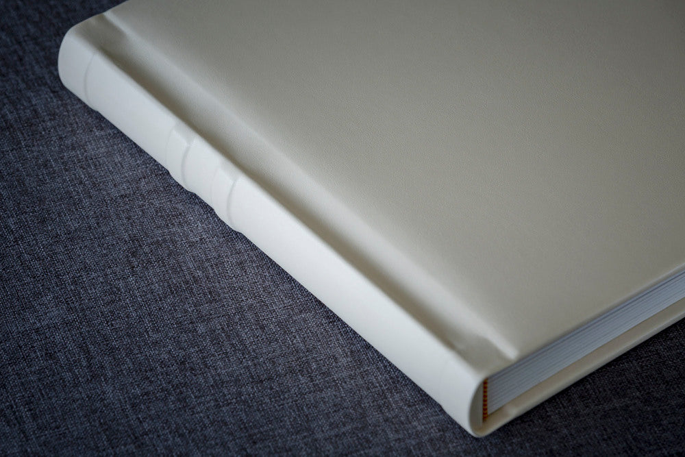 Create Your Own Personalised, Quality, 10x10 inch Black or Ivory Albums. They're easy to make yourself, or we can print your photos and assemble the album for you.
