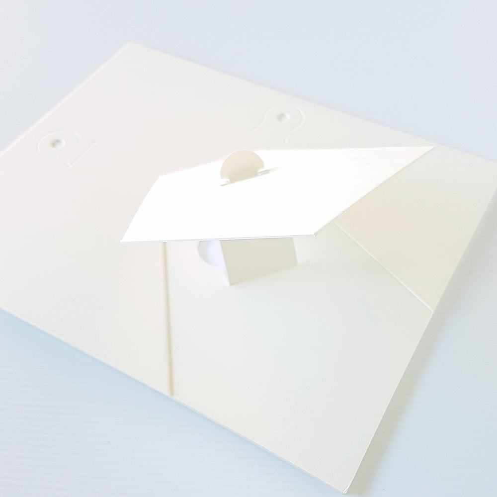 Each mount has its own built in stand on the back. Simply fold it out, click it in to place, and stand it up in a vertical OR horizontal position. Prints easily slide through a space at the side of the mount.