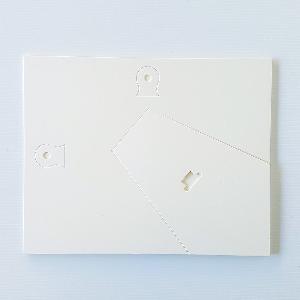 Each mount has its own built in stand on the back. Simply fold it out, click it in to place, and stand it up in a vertical OR horizontal position. Prints easily slide through a space at the side of the mount.